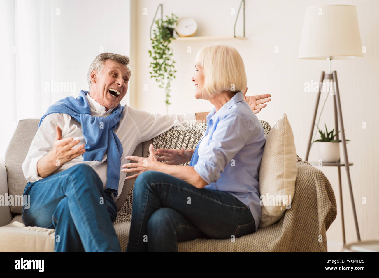 Pleasant conversation. Mature couple spending time together Stock Photo