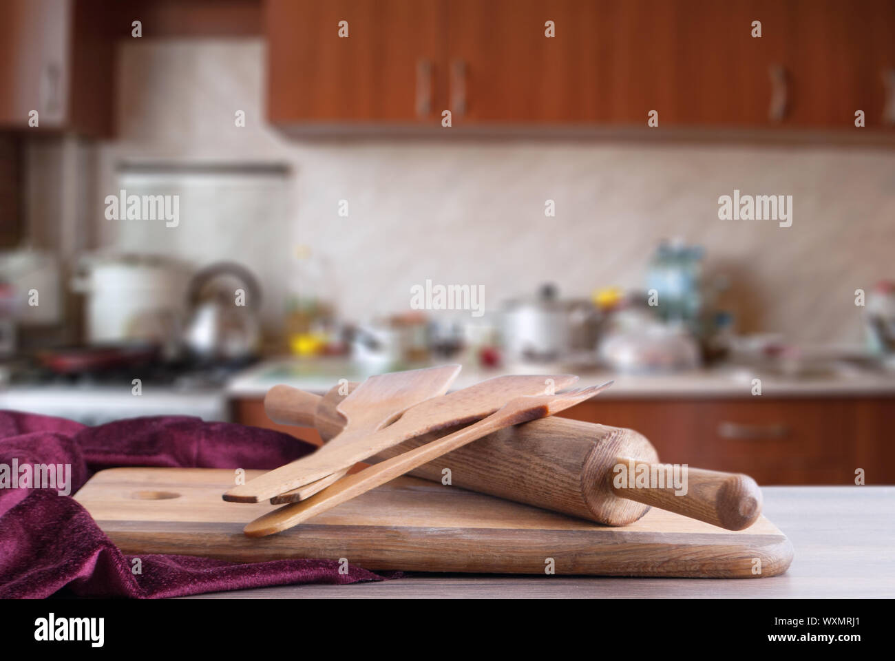 wooden surface and inventory on the background of the kitchen Stock Photo