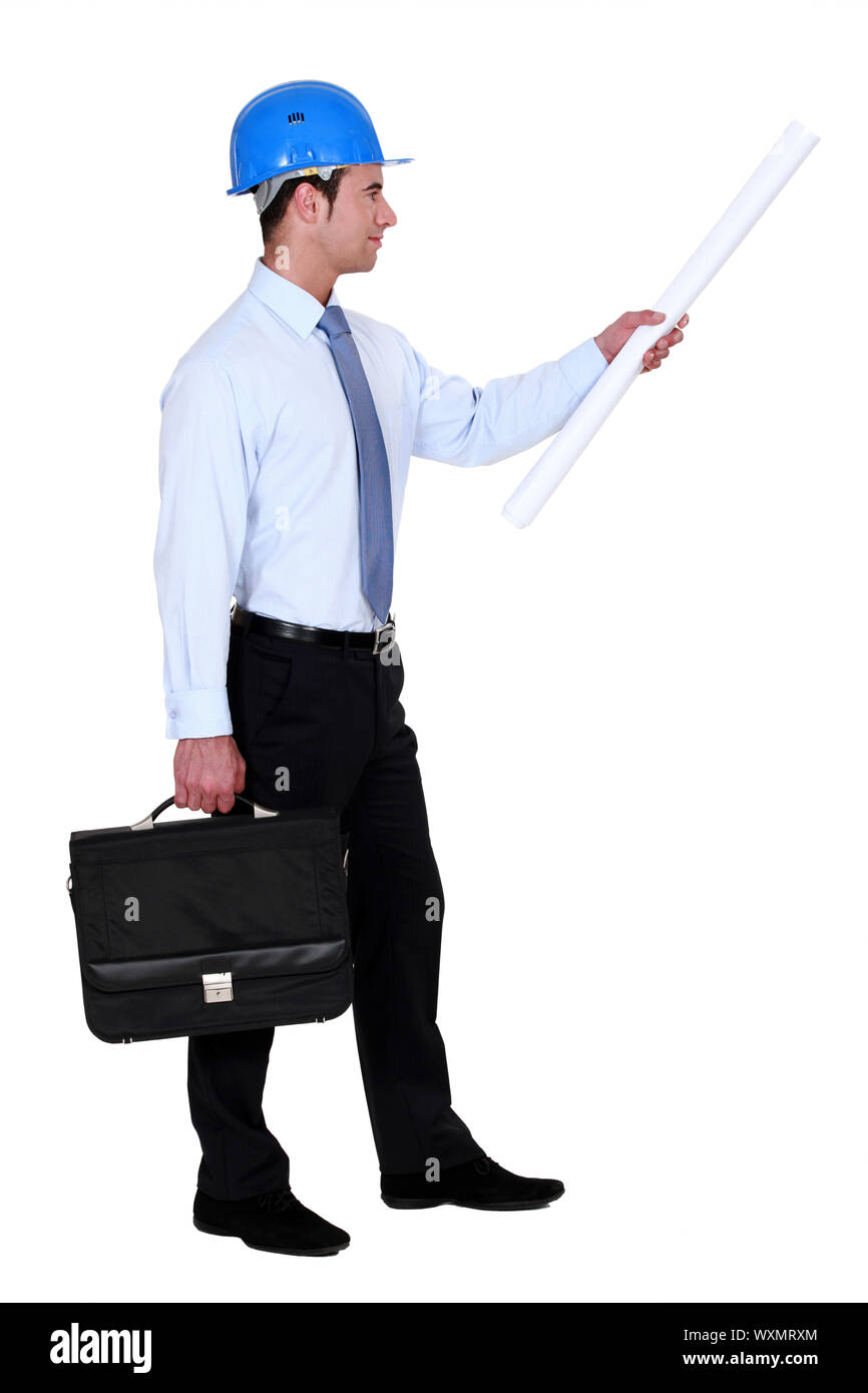 Architect with briefcase and plans Stock Photo Alamy