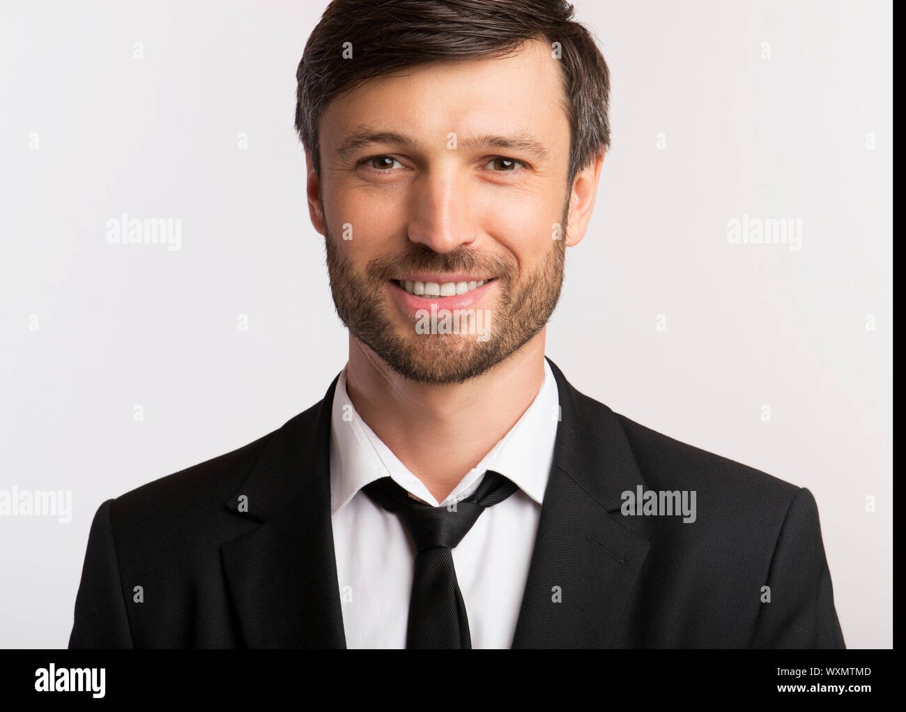 Smiling Businessman Looking At Camera On White Background, Isolated ...