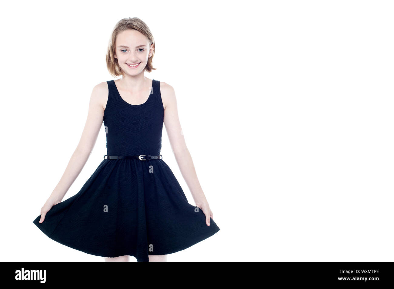 Attractive young girl wearing black frock Stock Photo