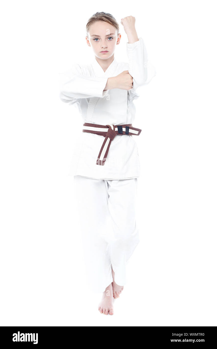 Young karate girl ready to attack Stock Photo Alamy