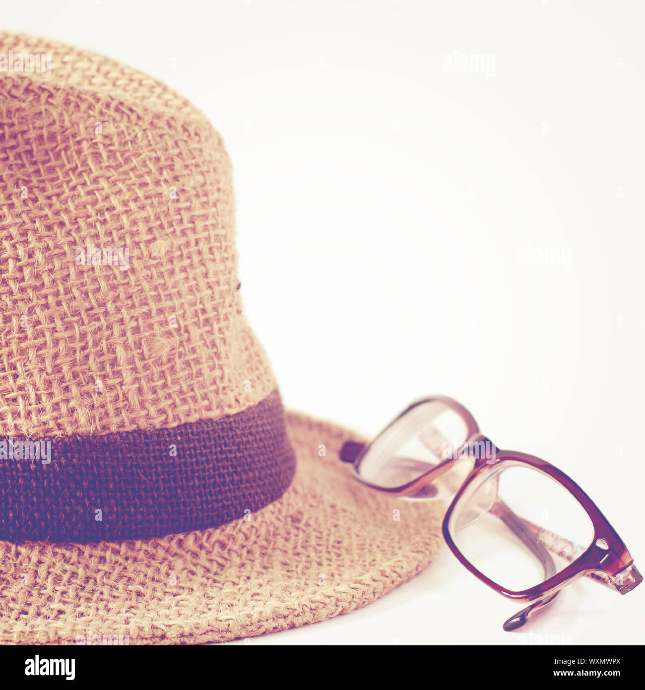 Summer straw hat with glasses with retro filter Stock Photo