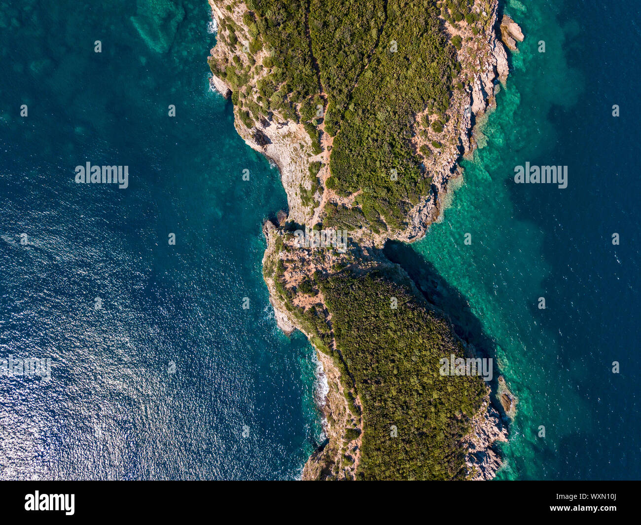 Aerial view of Sveti Nikola, Budva island, Montenegro. Jagged coasts with sheer cliffs overlooking the transparent sea. Wild nature Stock Photo