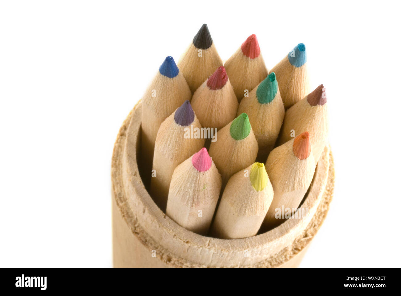 colored pencils in wooden container Stock Photo Alamy