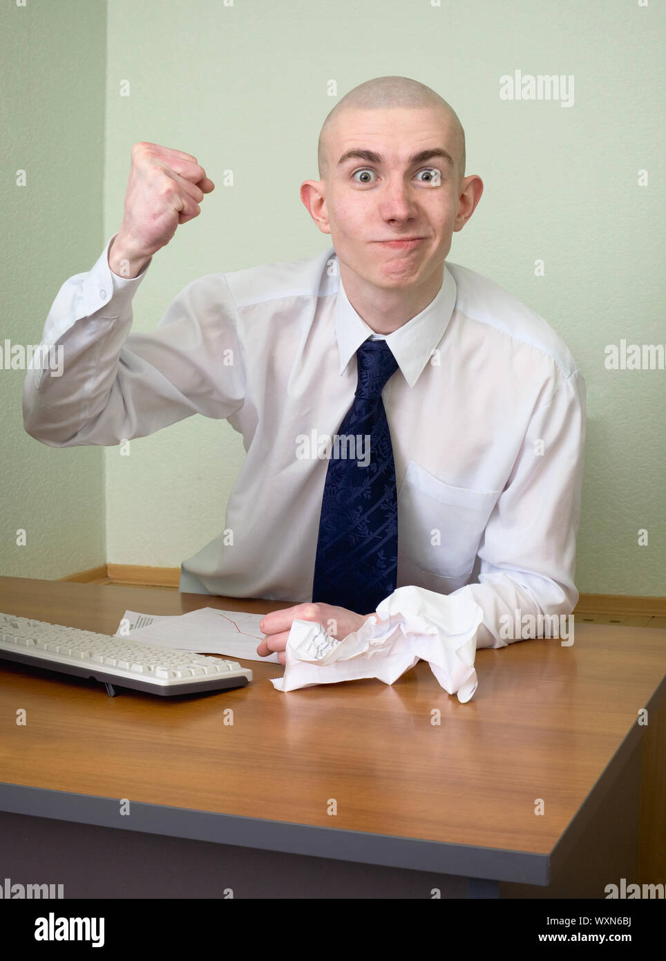 Emotional manager at office on a workplace Stock Photo