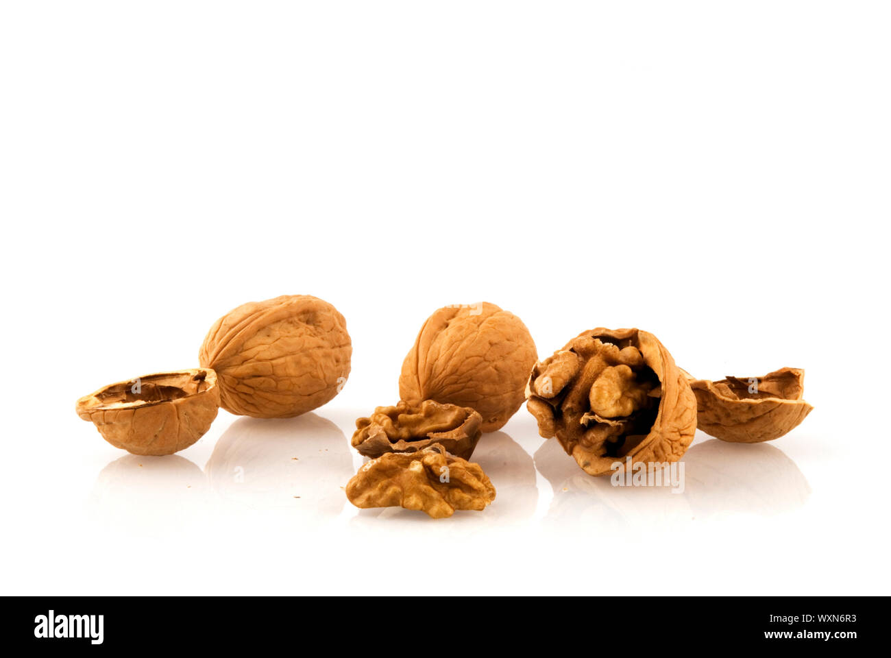 open and closed walnuts Stock Photo