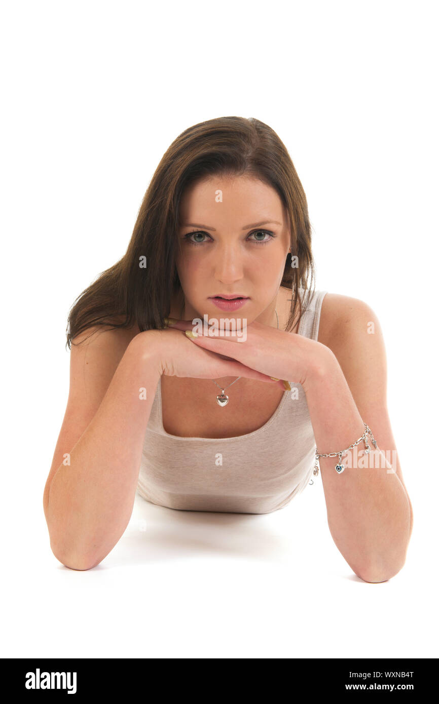 Pretty young girl with long hair is laying at the floor Stock Photo - Alamy
