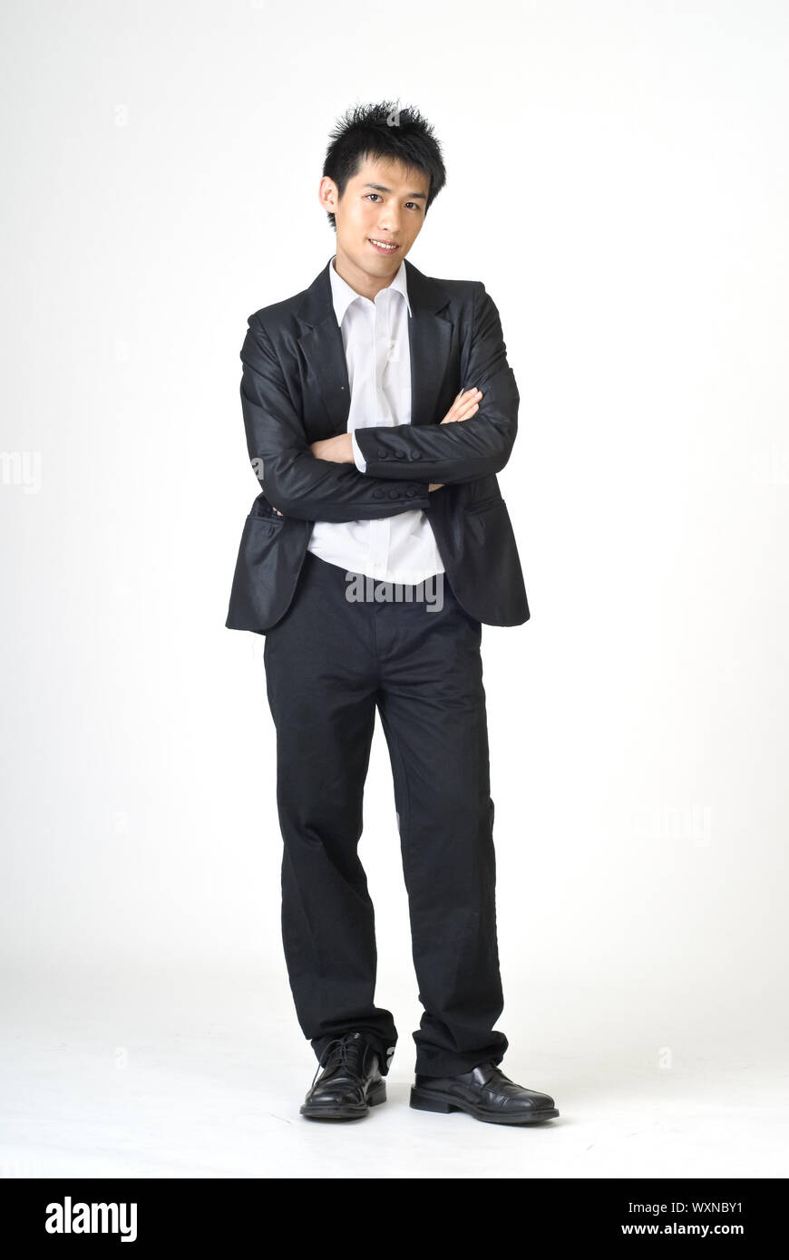 Young business man of Asian, full length portrait isolated on white ...