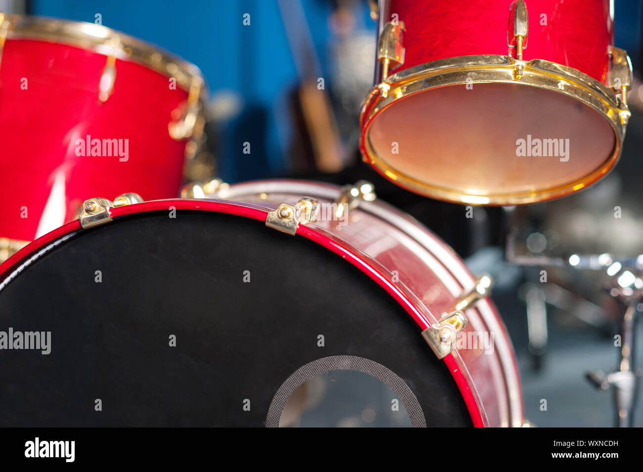 Red drum kit in recording studio Stock Photo