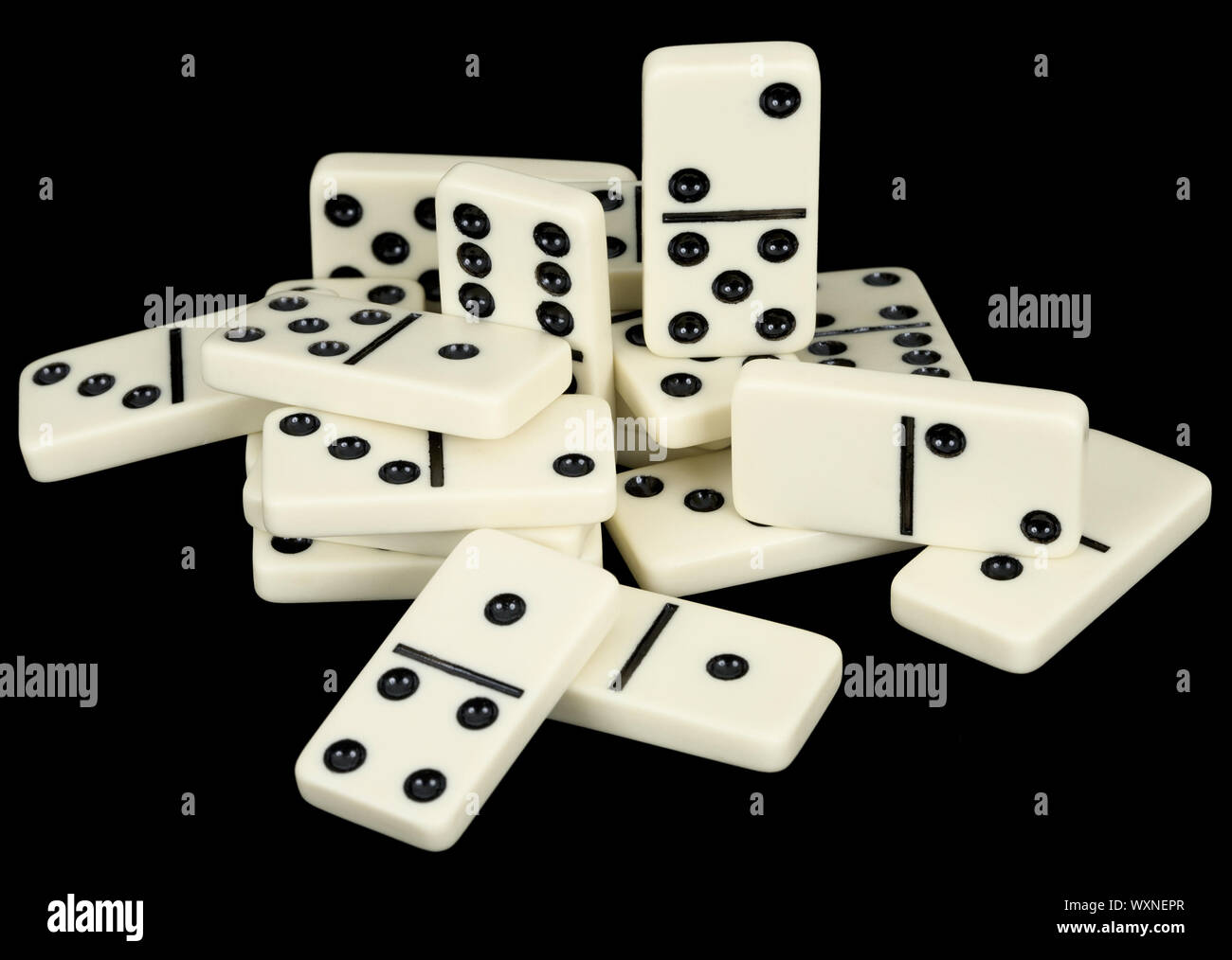 Small group from dominoes counters on a black background Stock Photo