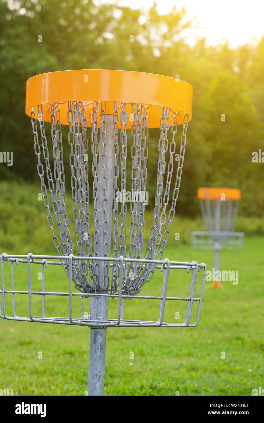 Disc golf basket in the park Stock Photo Alamy
