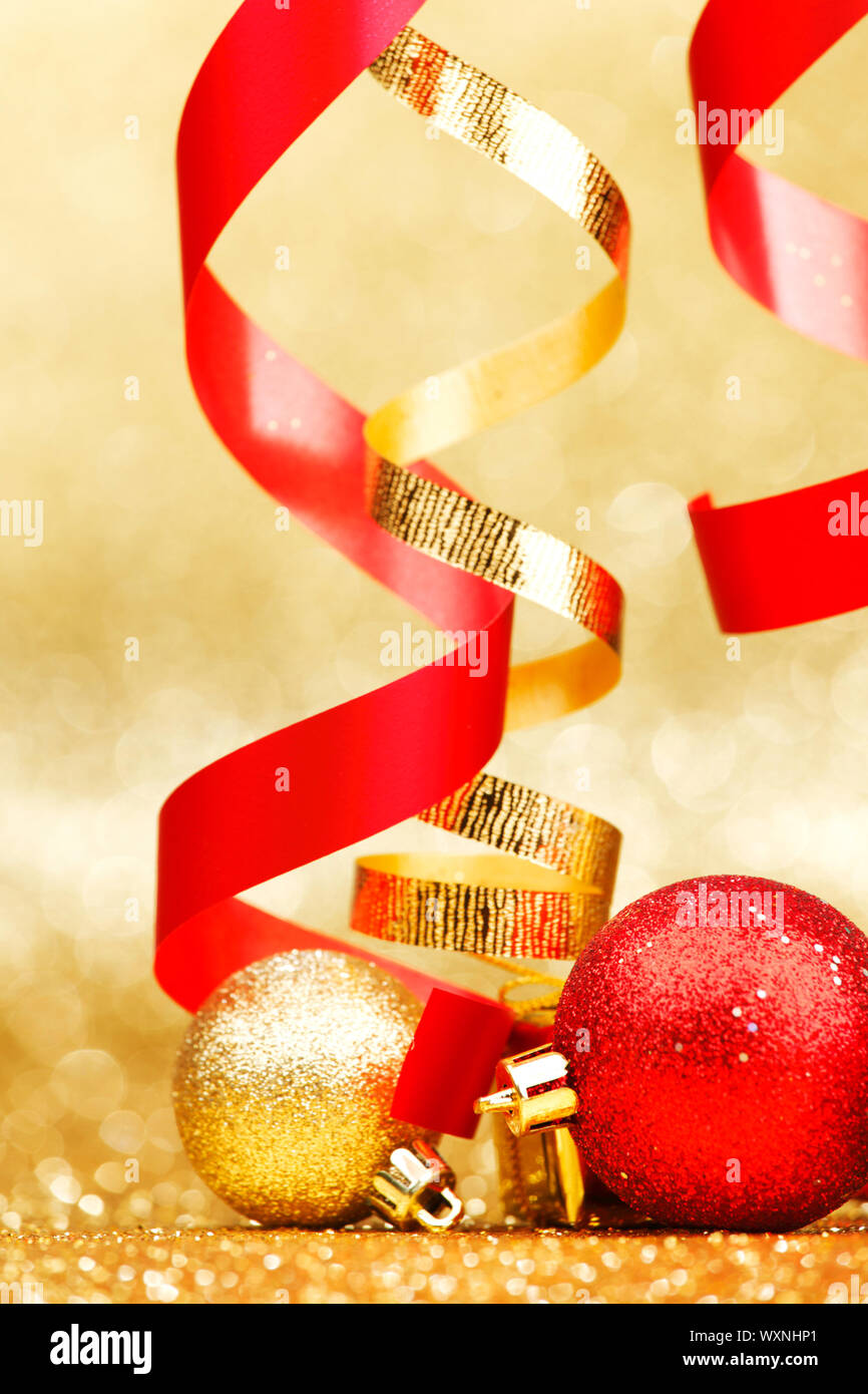 Golden and red Christmas balls with ribbons Stock Photo - Alamy