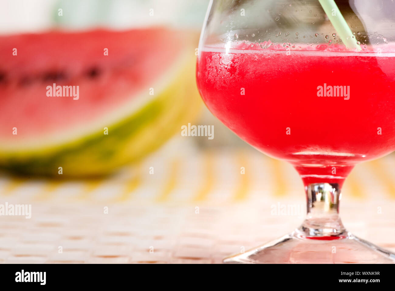 A red watermelon drink on a picnic table Stock Photo - Alamy