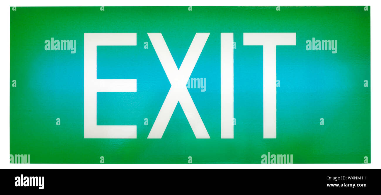 A green illuminated emergency exit sign Stock Photo