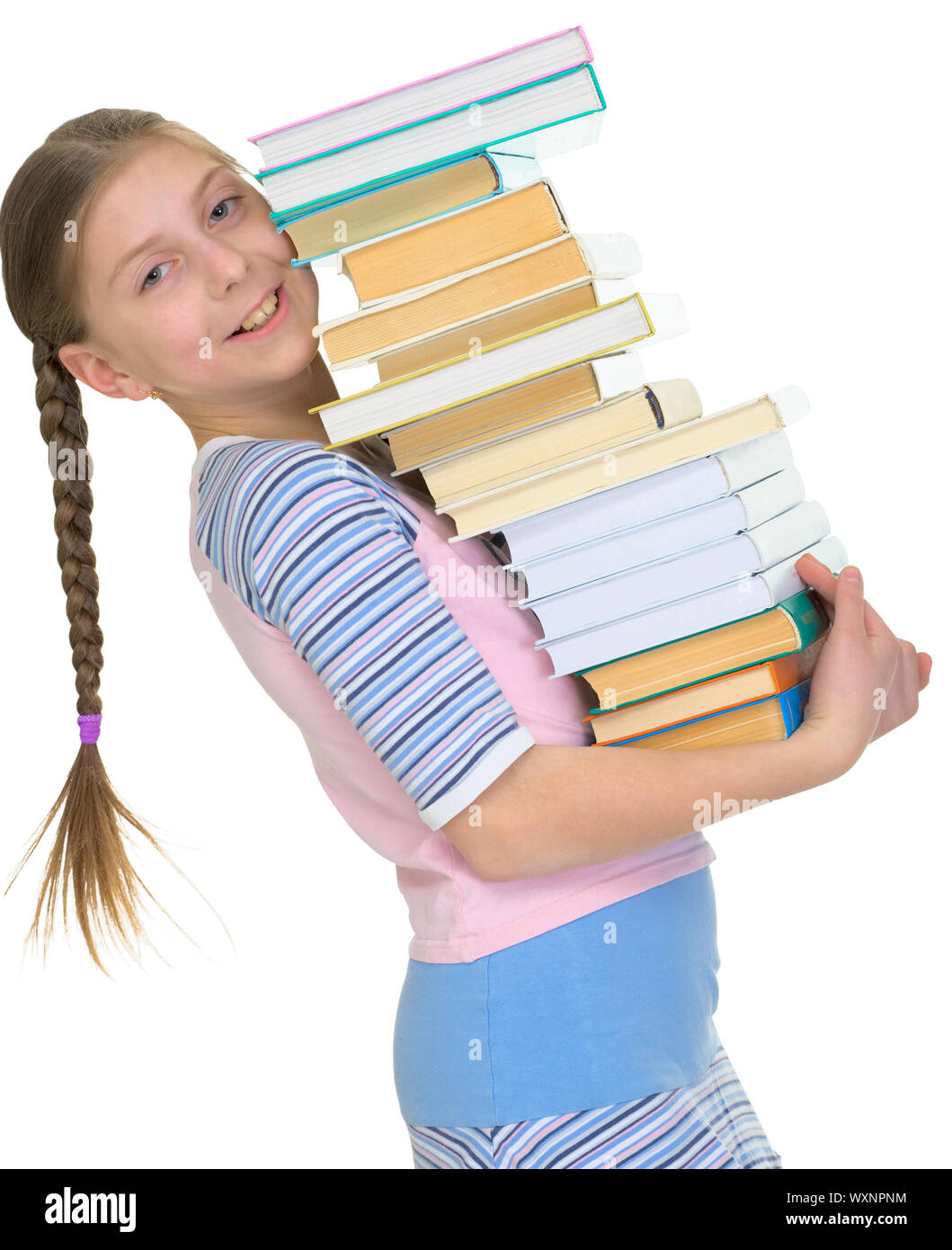 Girl - the schoolgirl with the big pile of books in hands Stock Photo ...
