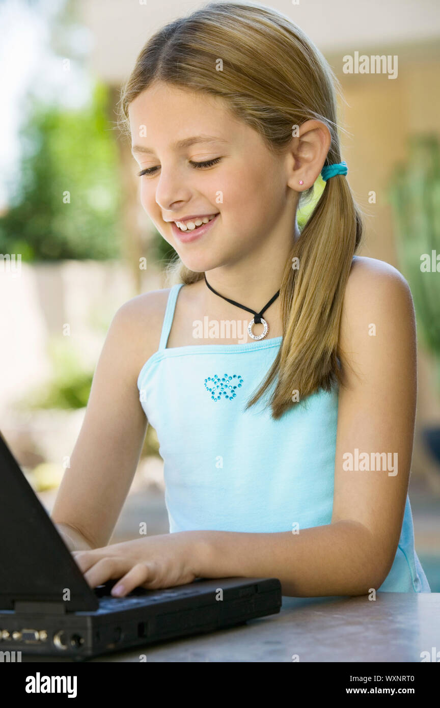 Caucasian girl tween alone computer hi-res stock photography and images ...