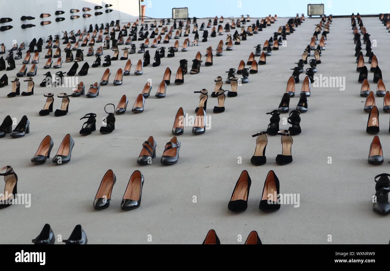 Istanbul, Turkey. 17th Sep, 2019. High heels are installed on a facade of a building in downtown Istanbul, Turkey, Sept. 17, 2019. A total of 440 pairs of high-heel black shoes were installed recently on a facade of a building in downtown Istanbul to draw attention to the equal number of women murders in Turkey last year and raise awareness against increasing male violence in the country. Credit: Xu Suhui/Xinhua/Alamy Live News Stock Photo