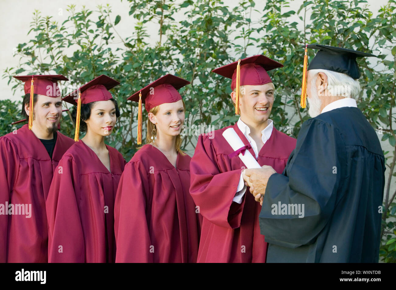 Graduation ceremony handshake hires stock photography and images Alamy