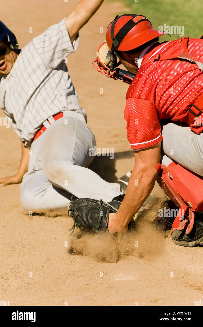 Close Play at Home Plate in Baseball Game Stock Photo