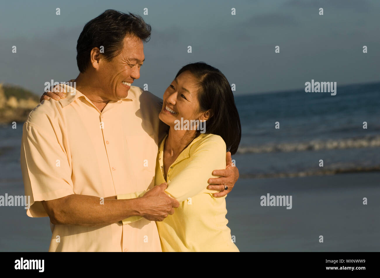 Happy Couple on Beach Stock Photo