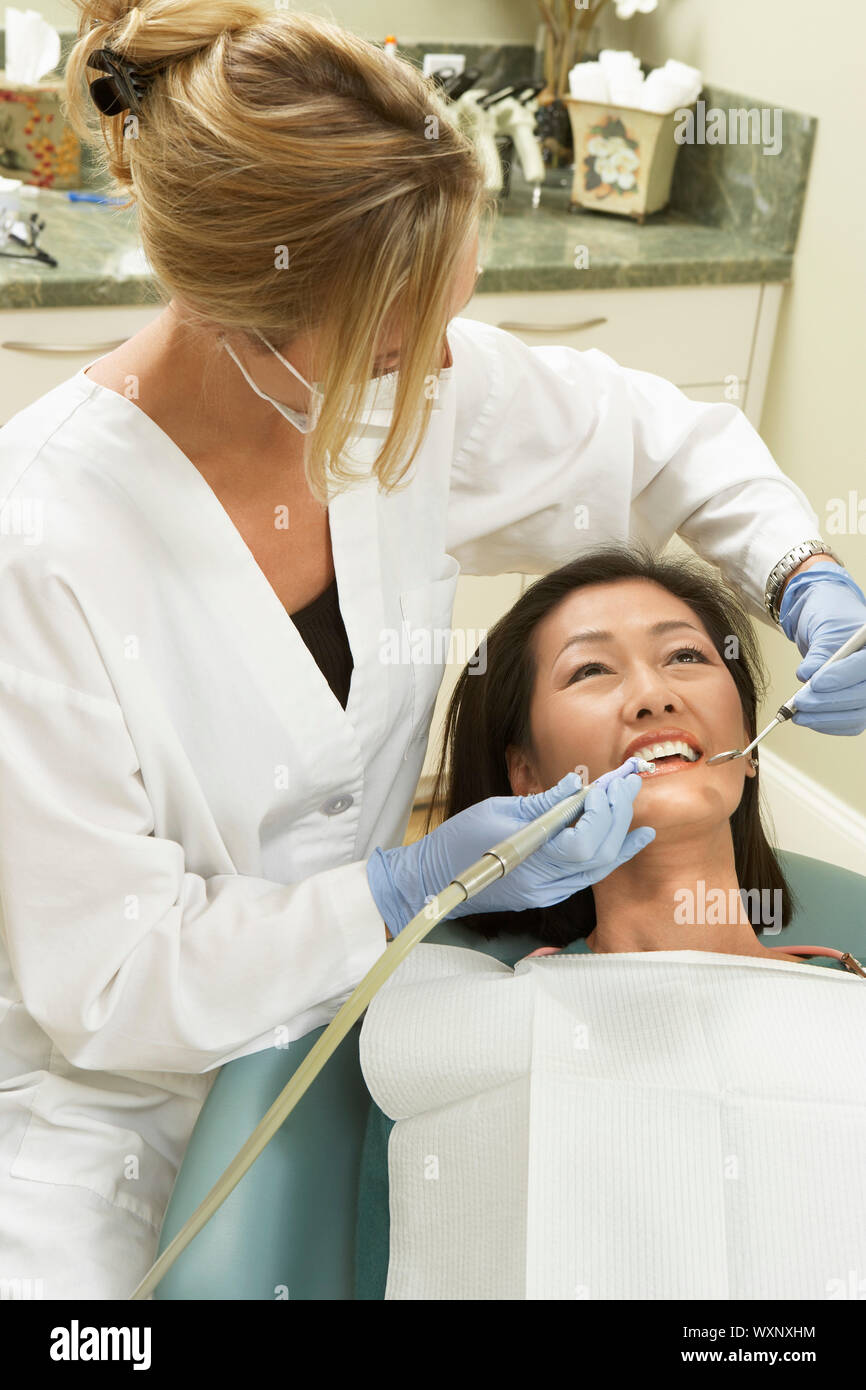 Woman Getting Dental Work Done Stock Photo Alamy