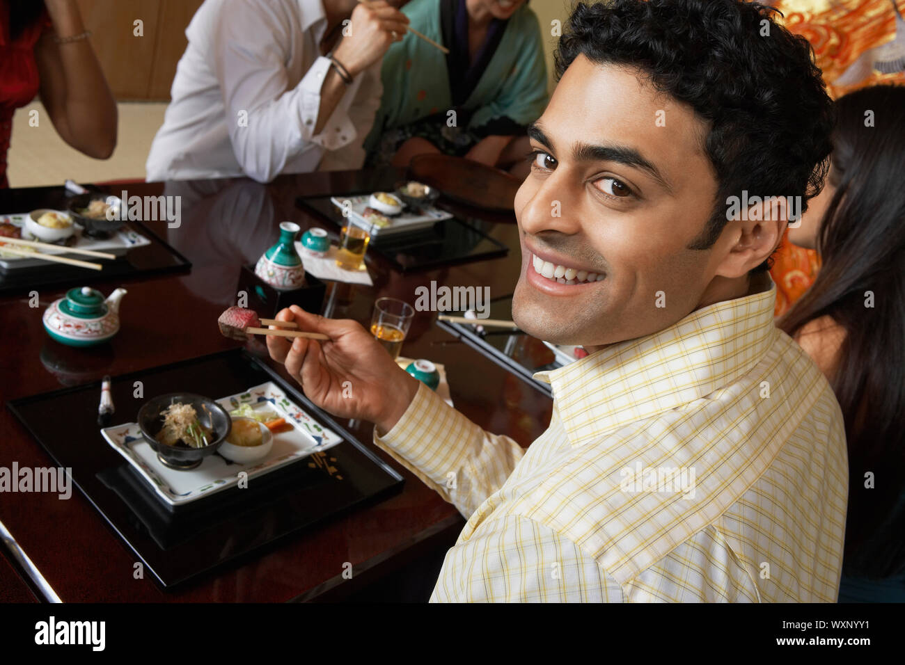 Friends Dining Out Together Stock Photo