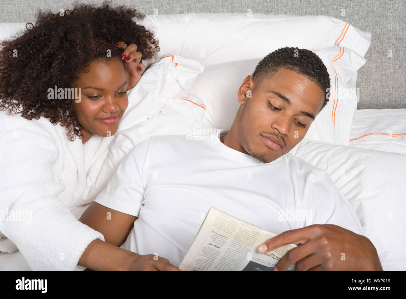Couple Together in Bed Stock Photo