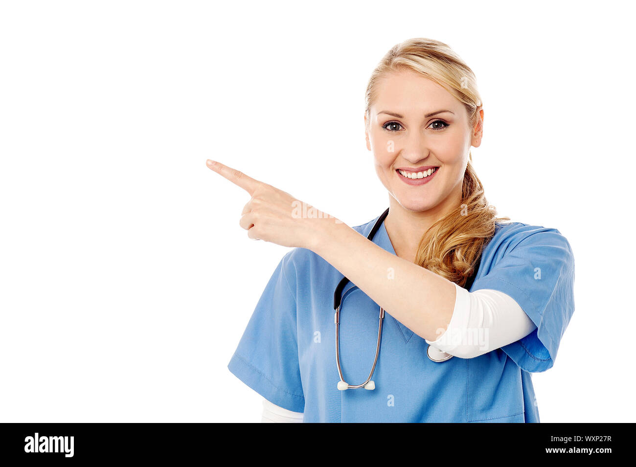 Doctor Point Woman Female physician pointing at something Stock Photo - Alamy