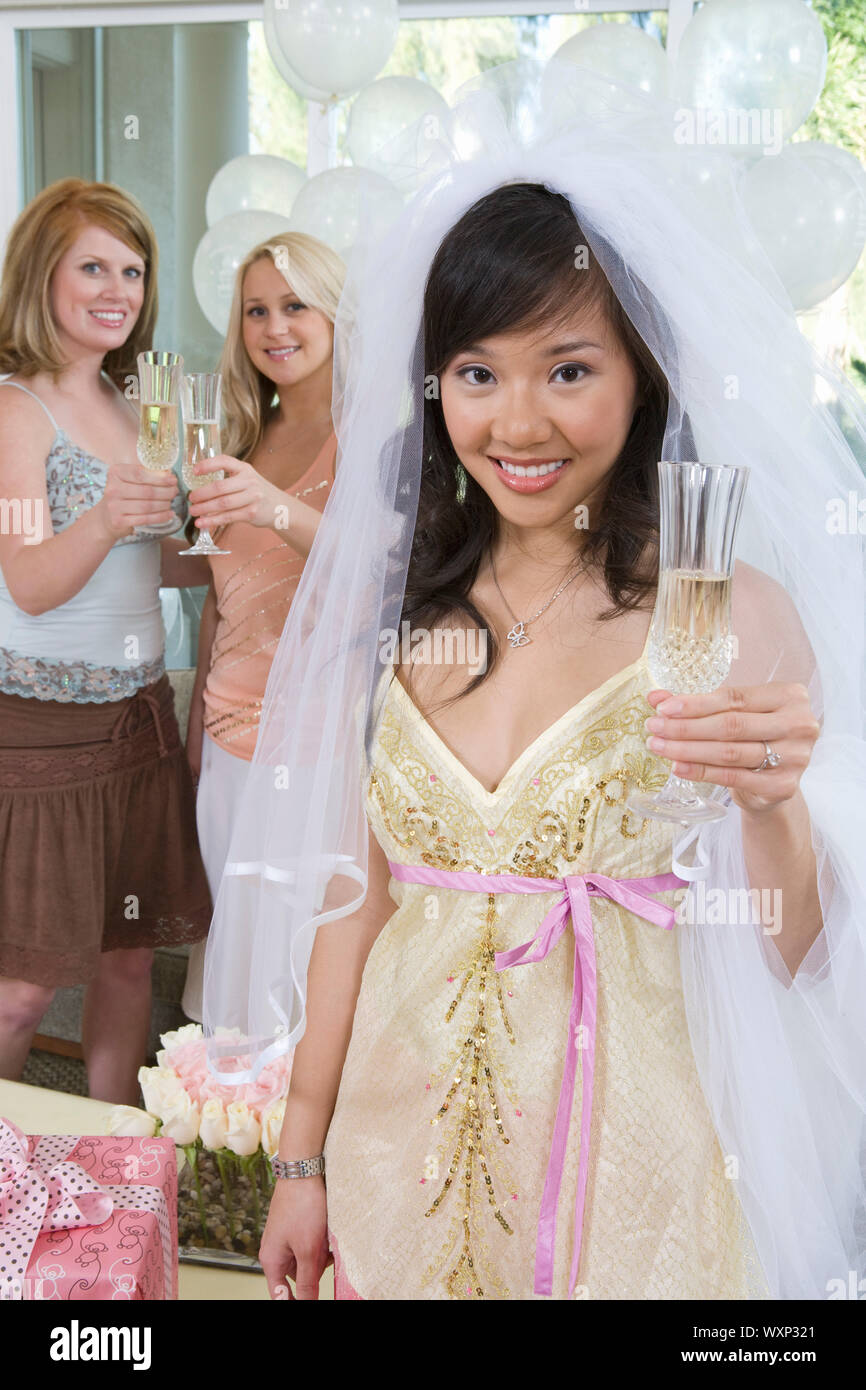 Bride celebrating at bridal shower with friends Stock Photo Alamy
