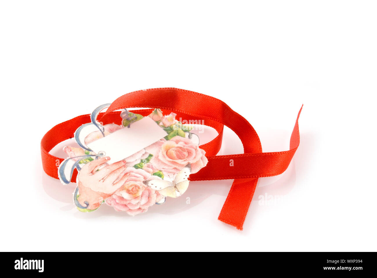 gift-card with red ribbon to write a name on Stock Photo - Alamy