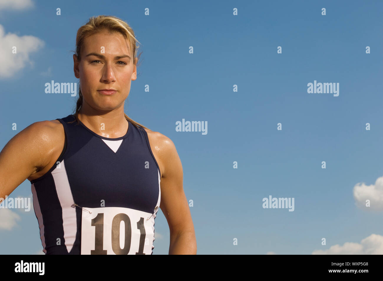 Female track athlete standing Stock Photo Alamy