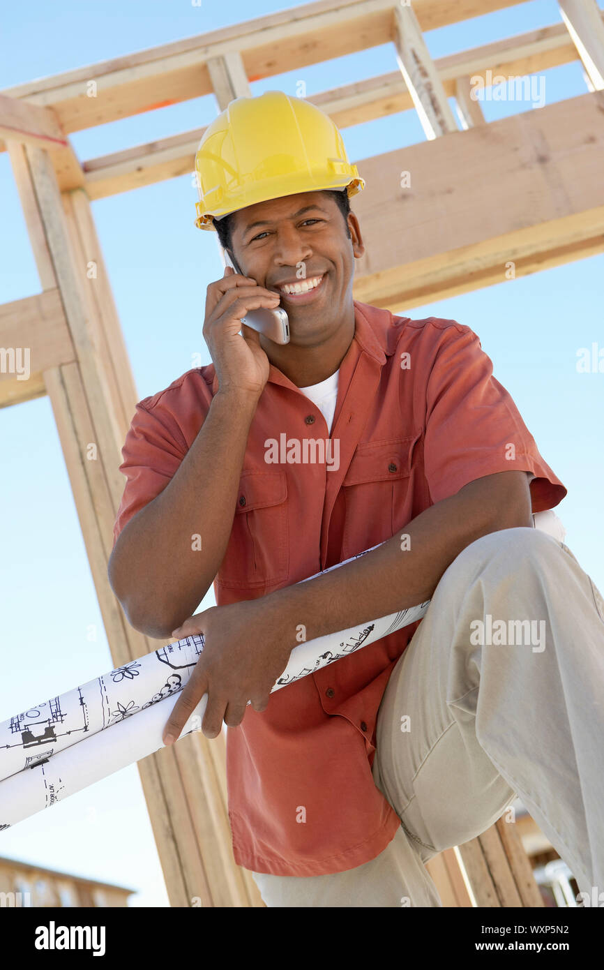 Architect Holding Blueprints Stock Photo Alamy