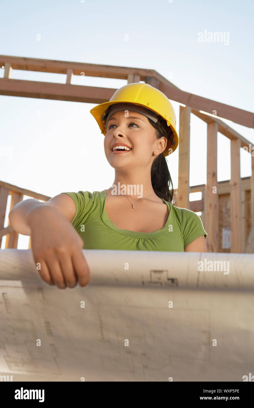 Architect Holding Blueprints Stock Photo Alamy