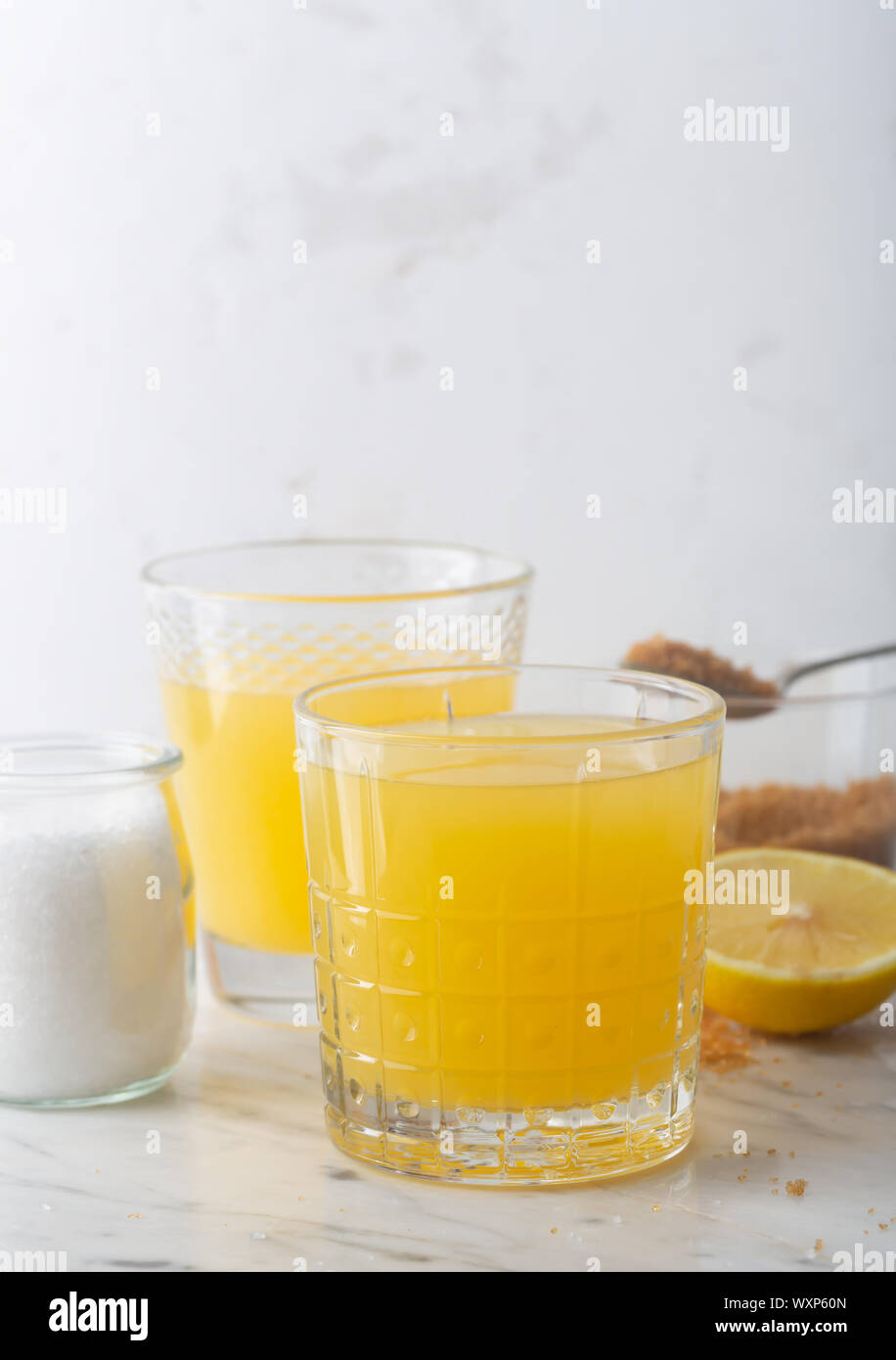 Homemade Isotonic Energy Drink and Ingredients. Glasses With Yellow Liquid, Homemade Sport