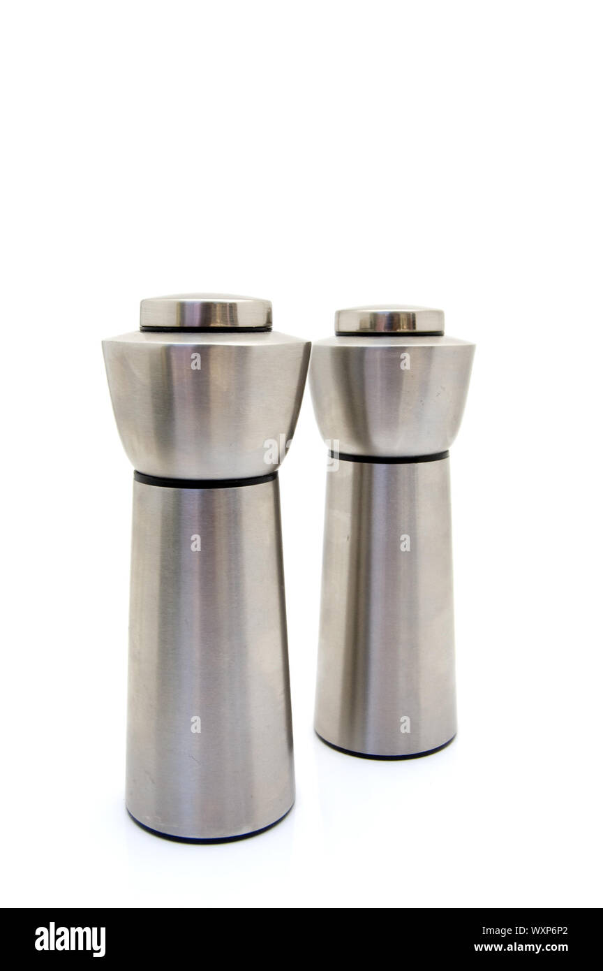Stainless steel salt and pepper mills on white Stock Photo Alamy