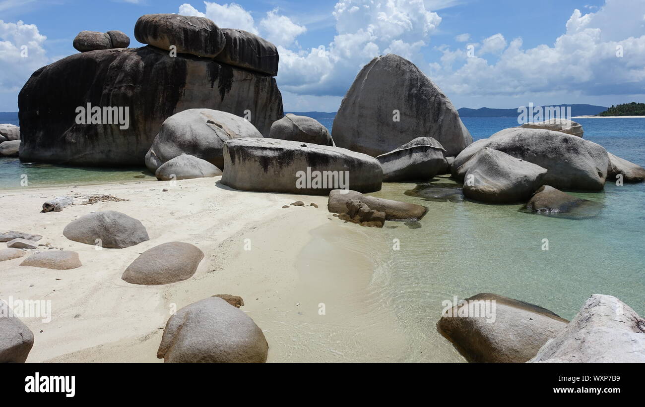 Indonesia Anambas Islands huge sea rocks beach wallpaper Stock Photo