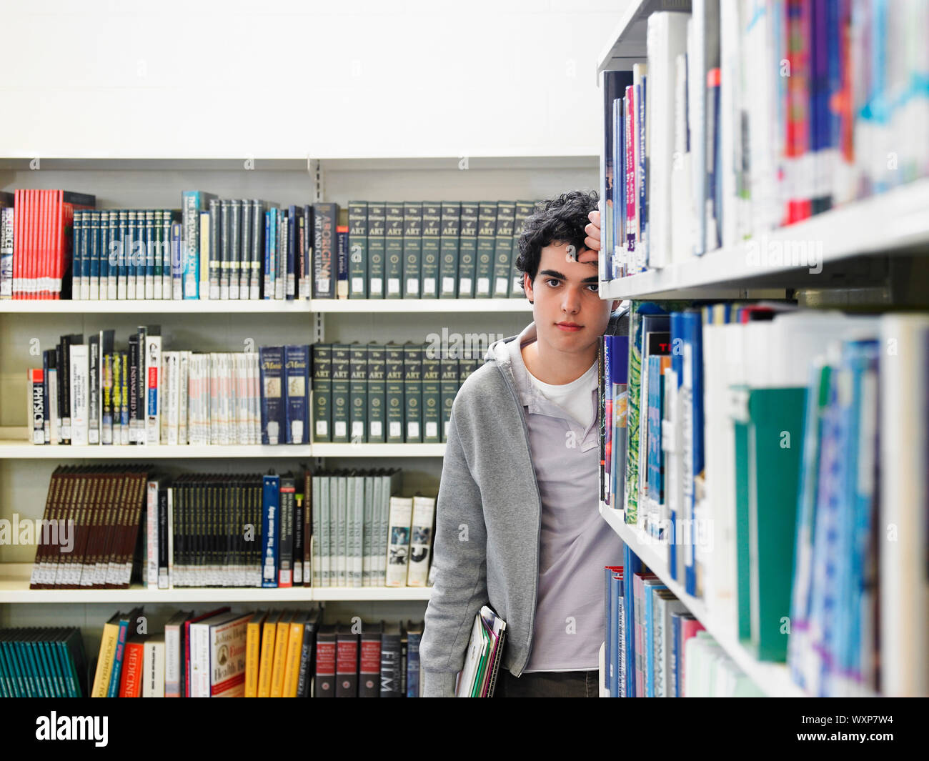 Student in Library Stock Photo - Alamy