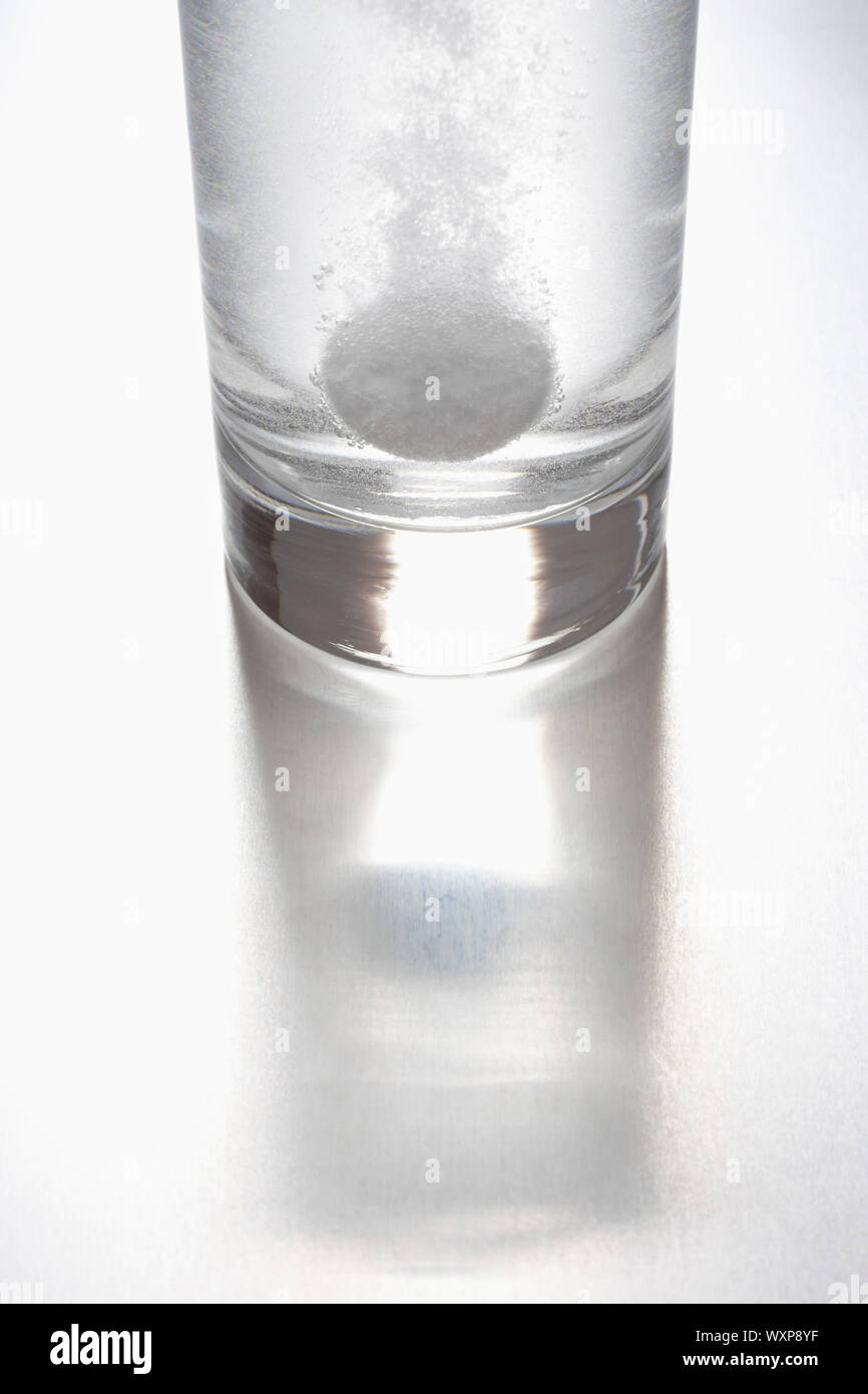 Tablet dissolving in glass of water Stock Photo Alamy