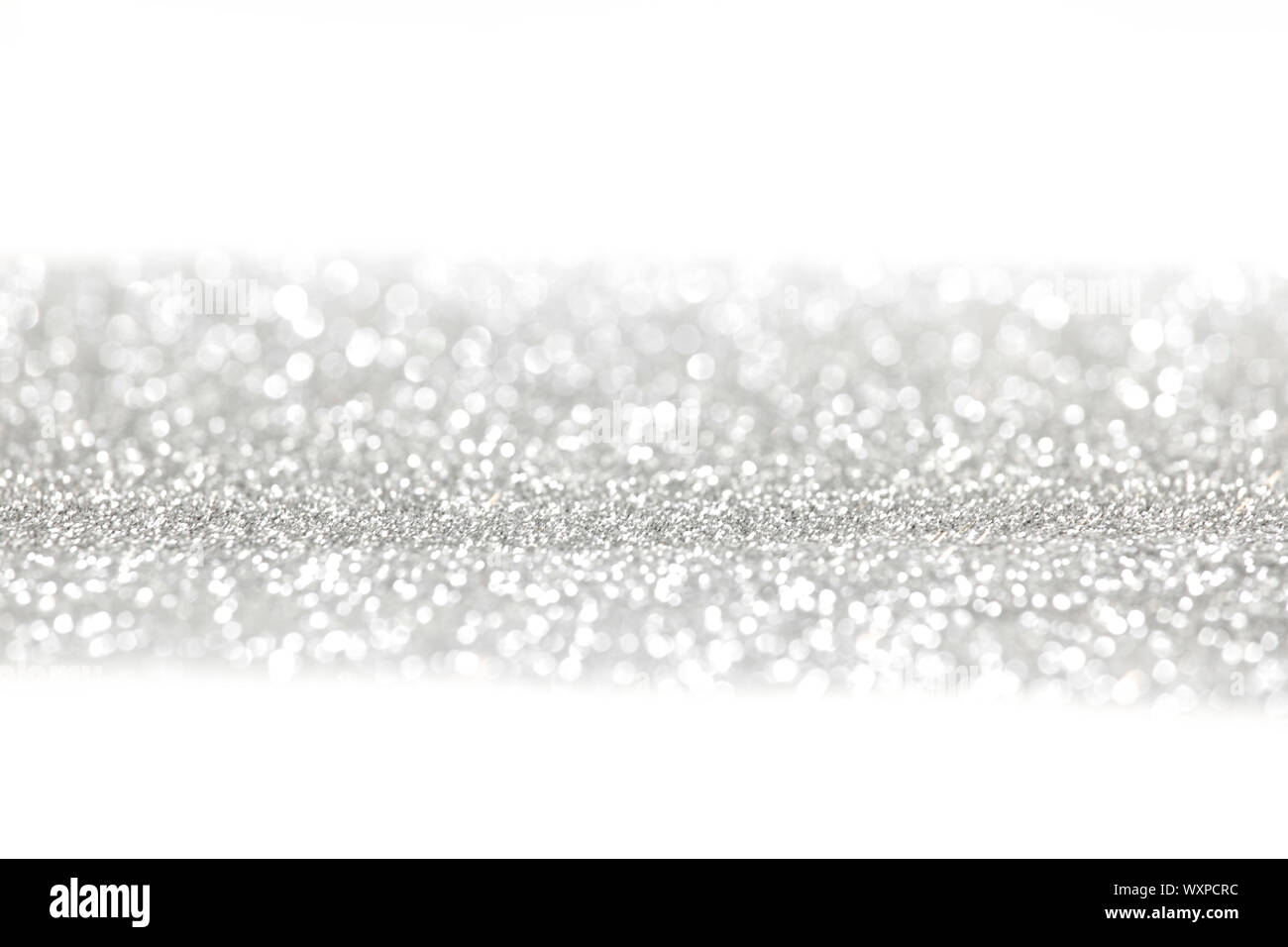 Silver glitter background with white copy space Stock Photo - Alamy