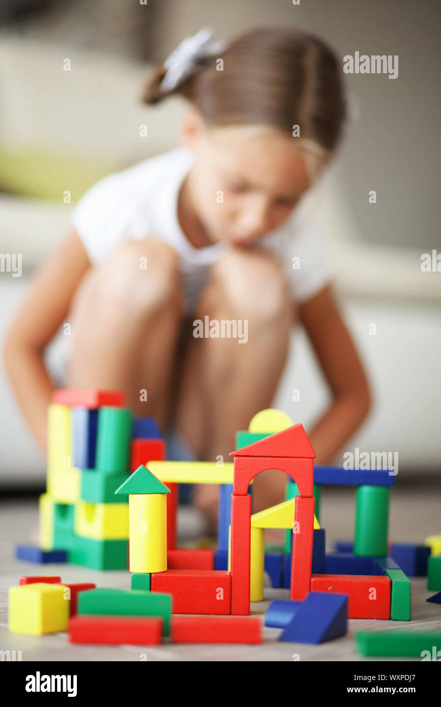 Child playing with blocks Stock Photo