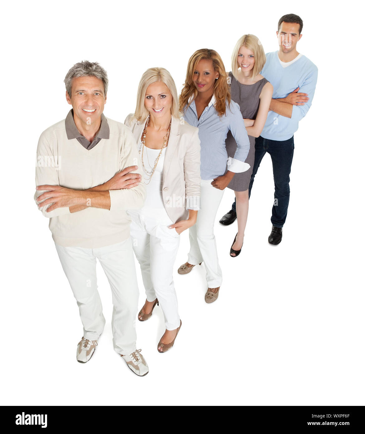Creative business team standing in line on white Stock Photo