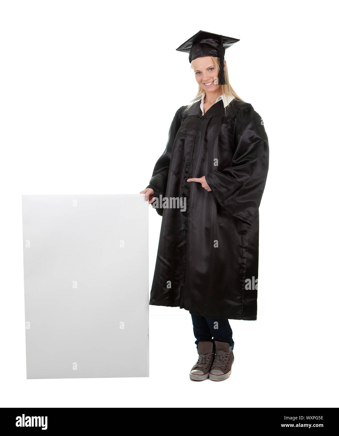 Female graduate student presenting empty board Stock Photo