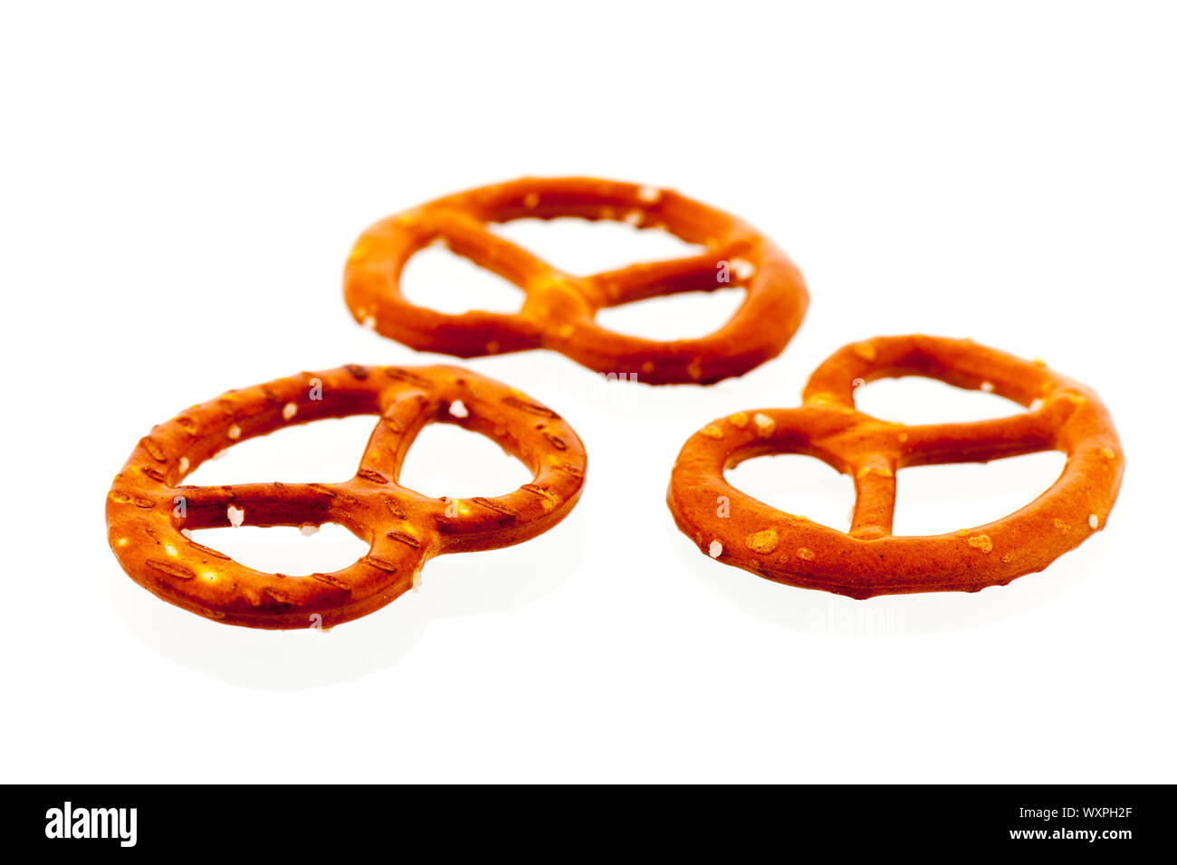 Several German pretzels isolated over white background Stock Photo