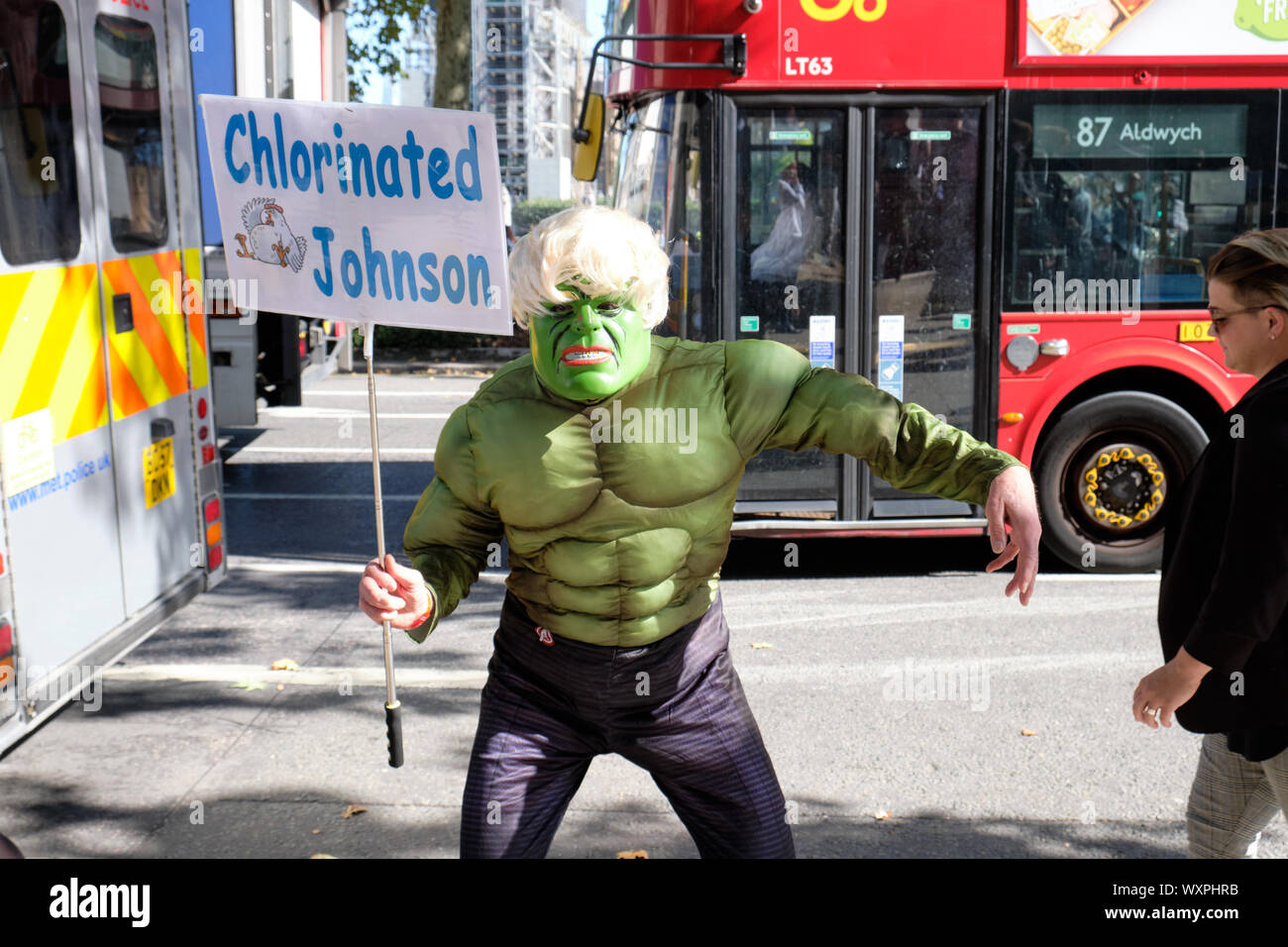 Pro Remain supporters in Hulk costume with Chlorinated Johnson sign front on Supreme Court in London Stock Photo