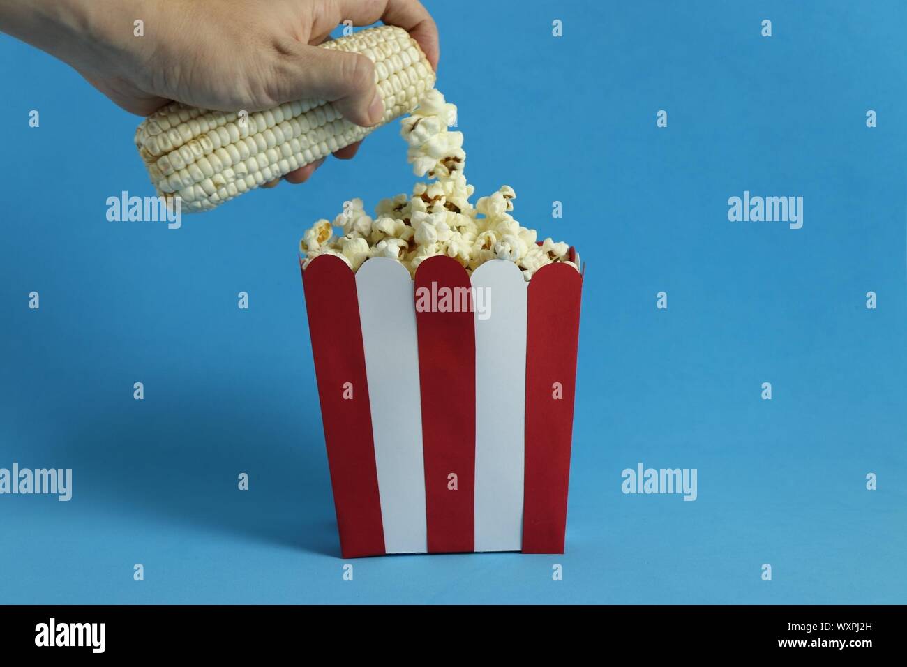Conceptual popcorn maker Stock Photo