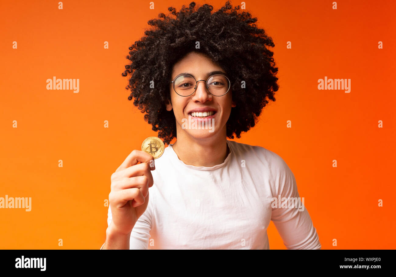 Cheerful Millennial Black Guy Holding Golden Bitcoin Stock Photo Alamy