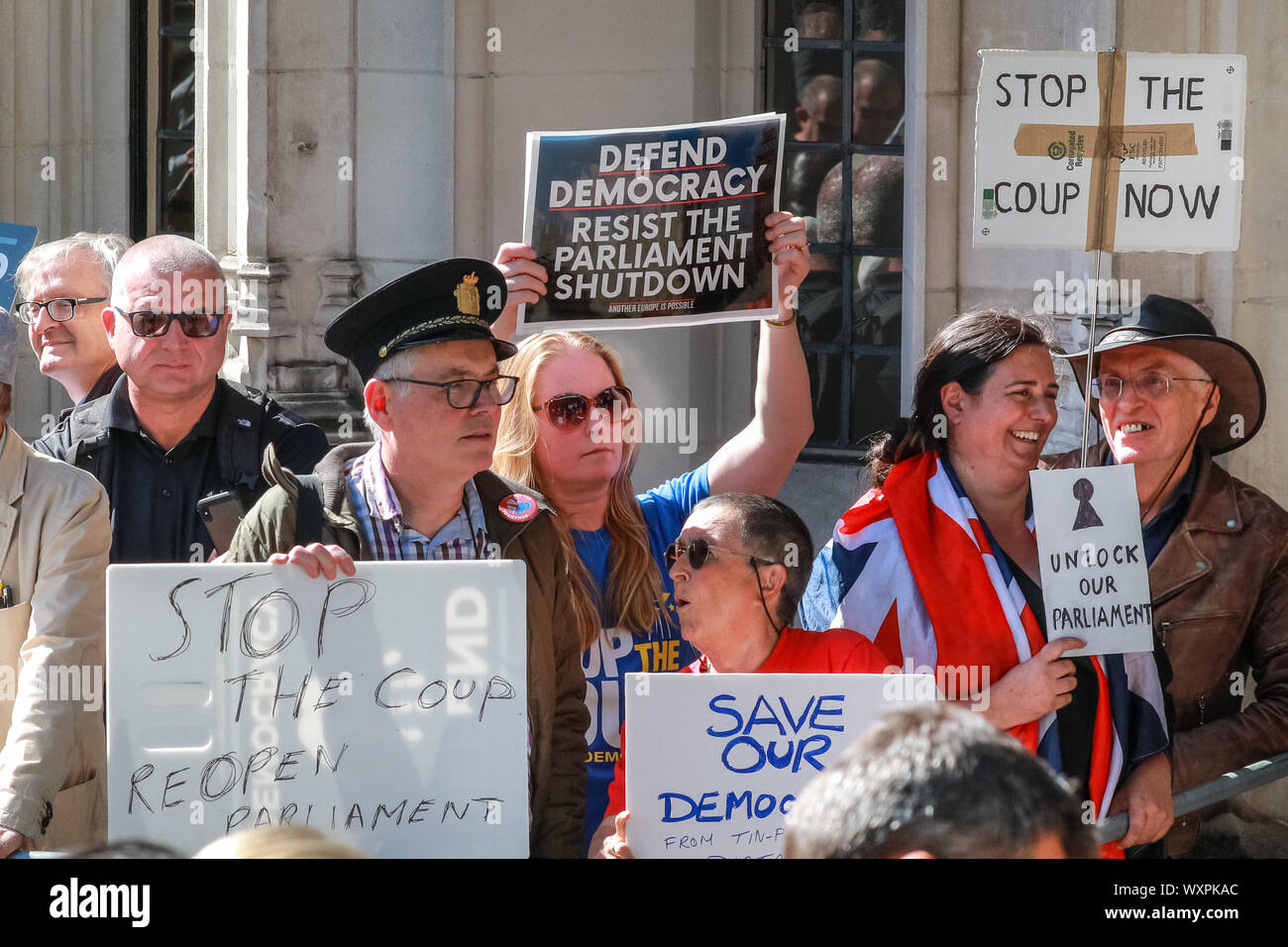 Westminster, London, UK, 17th Sep 2019. Protesters outside the building. The first day of the Supreme Court case over the suspension of Parliament, brought by lawyer Gina Miller who joined forces with former British PM John Major. The case will be heard over three days from today. Stock Photo