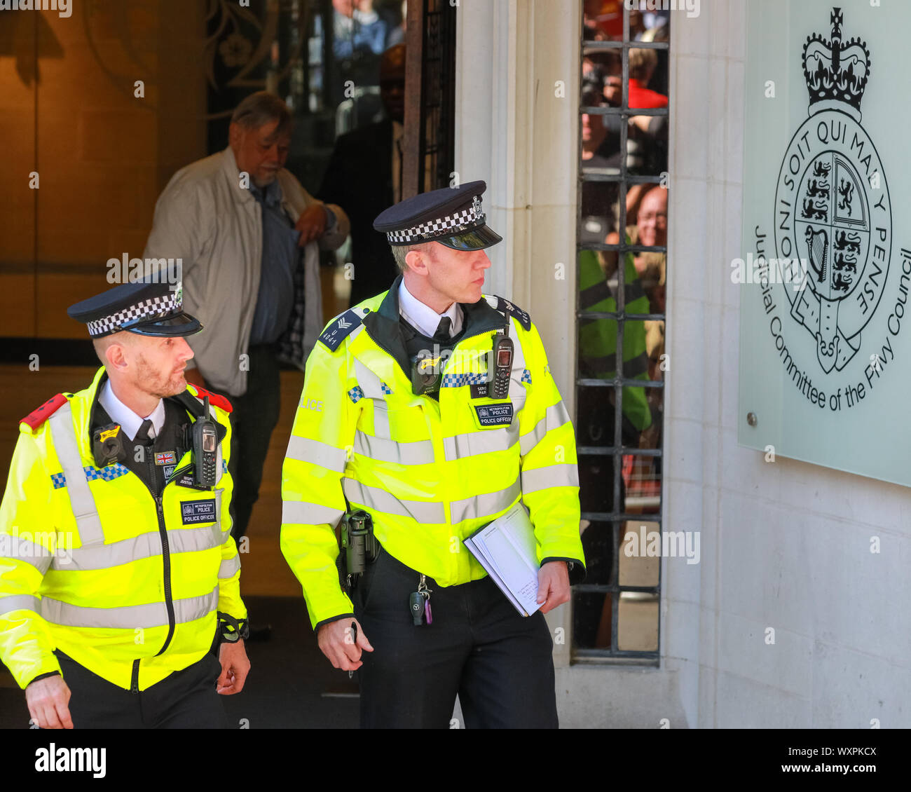 Westminster, London, UK, 17th Sep 2019. A large police presence ensures the safety of those inside and outside the building. The first day of the Supreme Court case over the suspension of Parliament, brought by lawyer Gina Miller who joined forces with former British PM John Major. The case will be heard over three days from today. Stock Photo