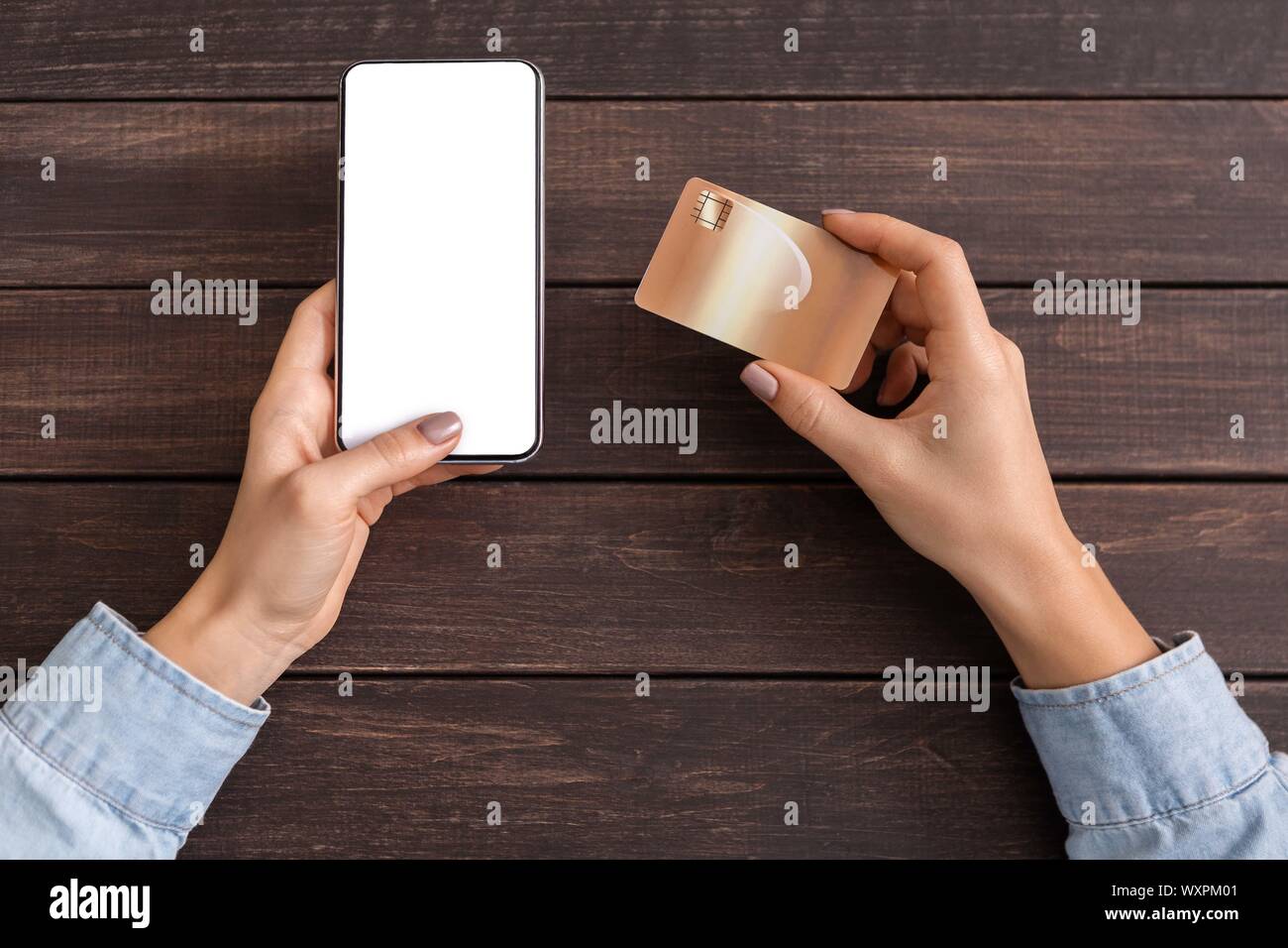 Female hands holding smartphone with blank screen and credit card Stock ...